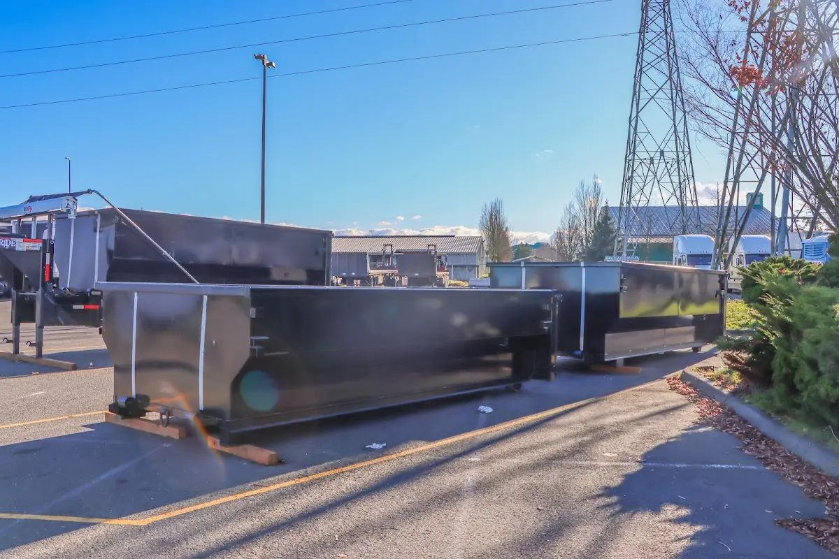 Roll-off dumpster ready for waste disposal at job site for Yard Waste Dumpster Rental in South Gate